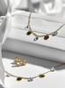 Bransoletka złota z kółeczkami i kryształkami ze stali szlachetnej BSA0046