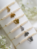 Bransoletka z perełkami i złotym motylkiem Feliz BMT0053