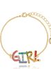 Bransoletka złota z kolorowym napisem GIRL BRG0257