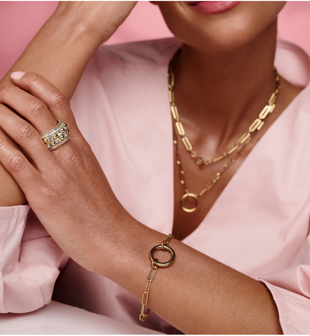 Pierścionek złocony z kulkami i kryształami PSS0217