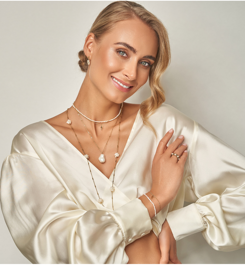 Bransoletka z perełkami i krzyżykiem Ocean Dance BPE0093