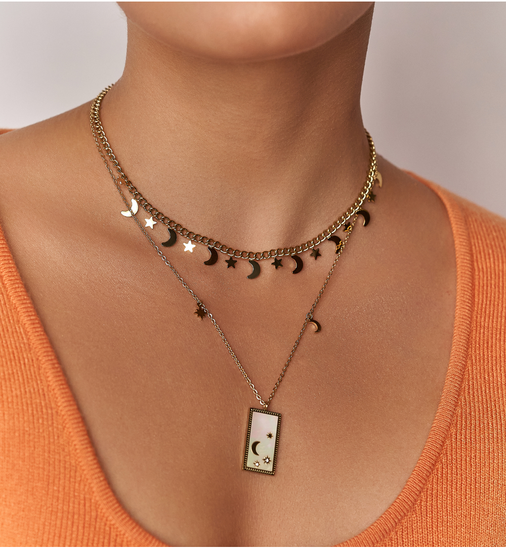 Naszyjnik złoty z zawieszką z galaktyką Ginette NSY0129