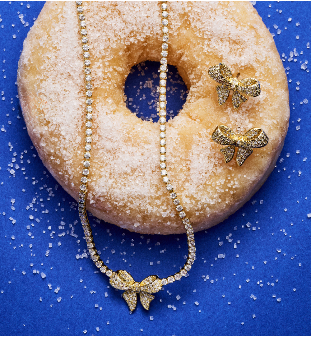 Kolczyki w kształcie kokardy wysadzane cyrkoniami KSS2117