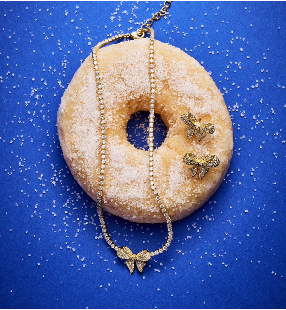 Kolczyki w kształcie kokardy wysadzane cyrkoniami KSS2117