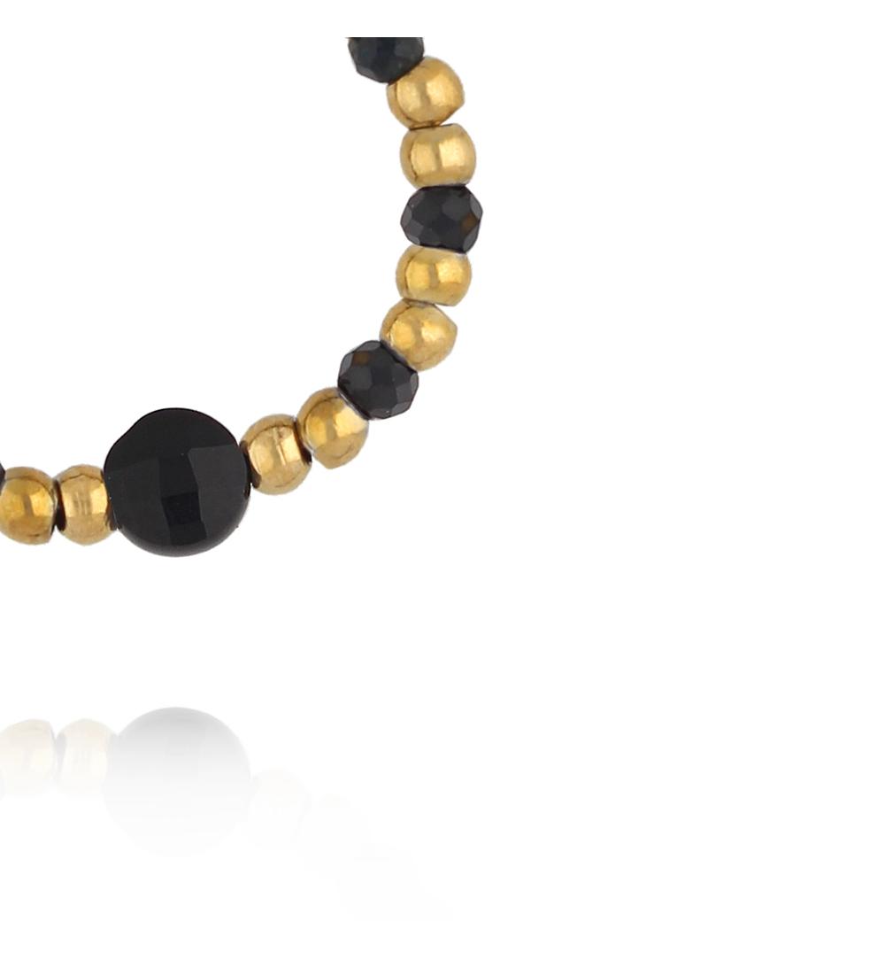 Pierścionek elastyczny ze złotych kuleczek z czarnym agatem PTW0615