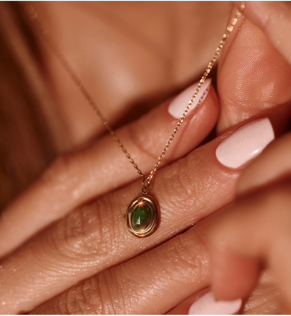 Zestaw biżuterii z zielonym oczkiem ZN0045