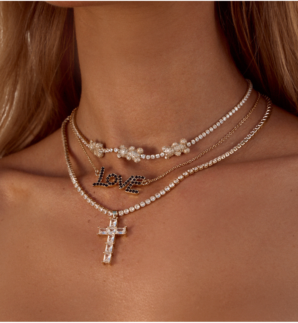 Naszyjnik złoty z transparentnym krzyżykiem Pia NRG0482