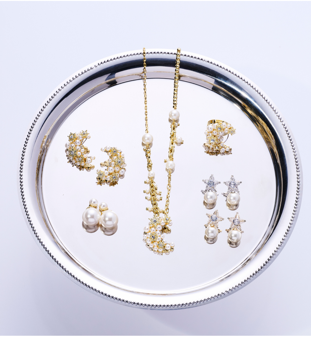 Kolczyki z gwiazdą z kryształów i perłą złote KLU0198