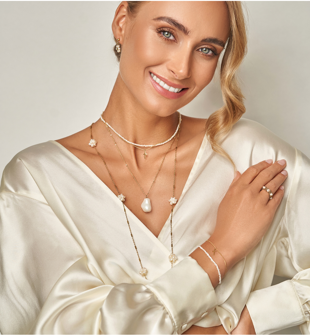 Bransoletka z perełkami i krzyżykiem Ocean Dance BPE0093