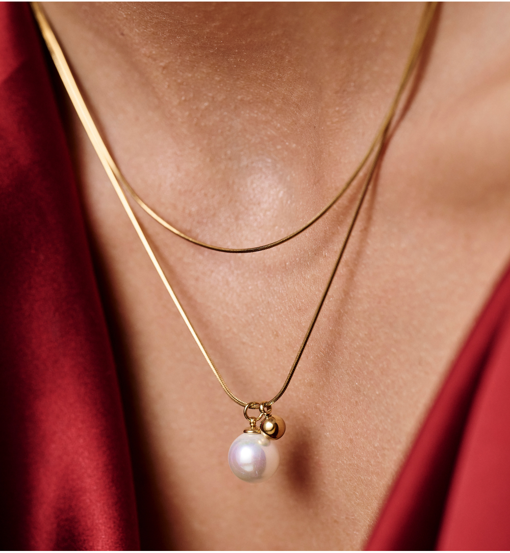 Naszyjnik podwójny ze stali szlachetnej złoconej z perłą NSY0699