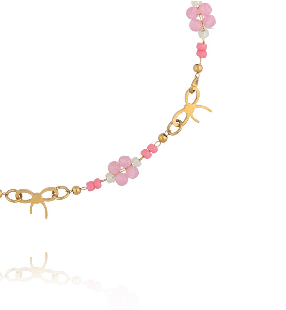 Bransoletka na nogę z różowymi koralikami i delikatnymi kokardkami BNSY0073