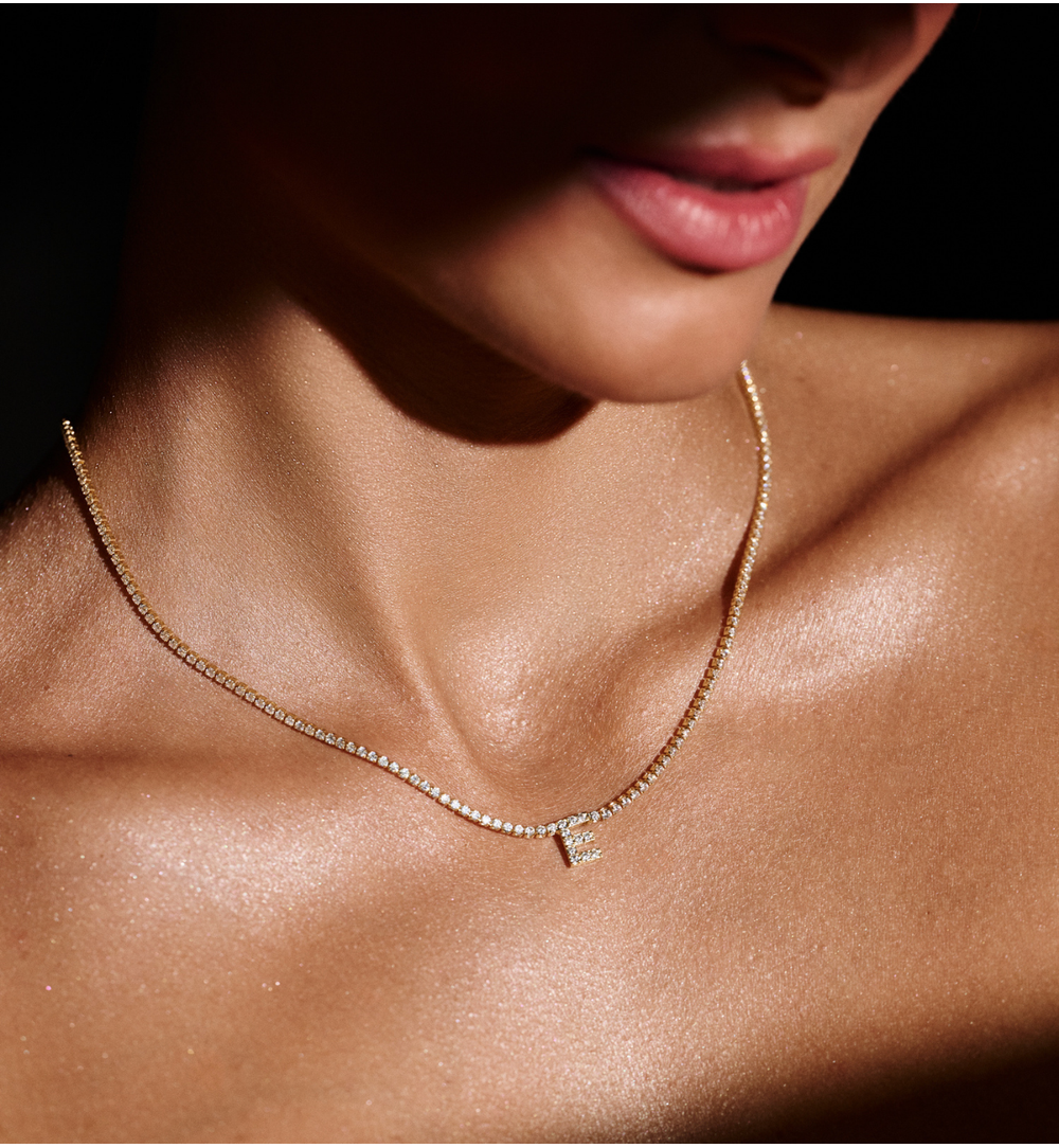 Naszyjnik typu tennis z literką E złoty NS0385