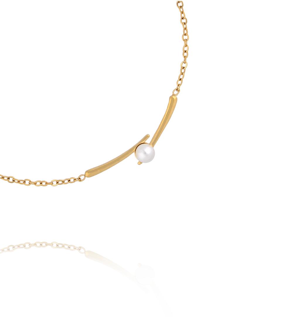Bransoletka z perłą zamkniętą w złotych liniach BSY0644