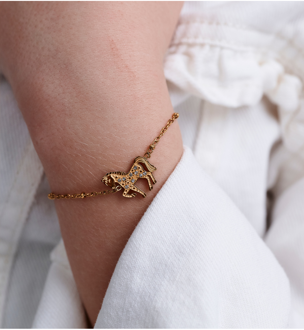 Zestaw biżuterii dla dziewczynki ze złotym konikiem ZN0218