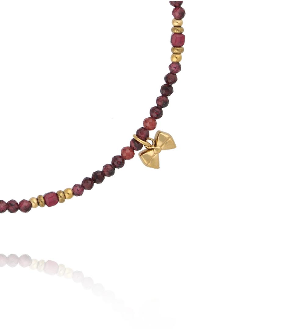 Bransoletka z naturalnego granatu i złoconą kokardką BTW3535