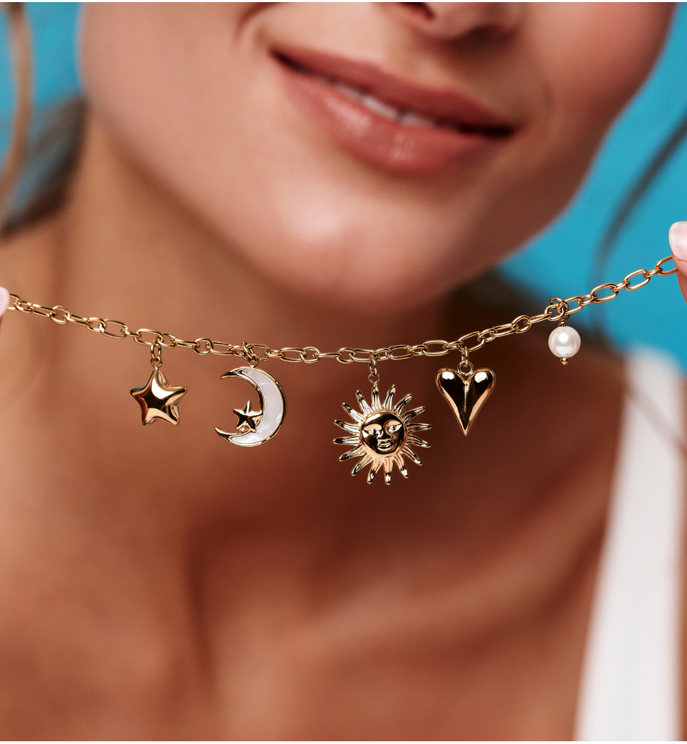 Bransoletka złota z zawieszkami – serce, słońce, księżyc i gwiazda BSH0210