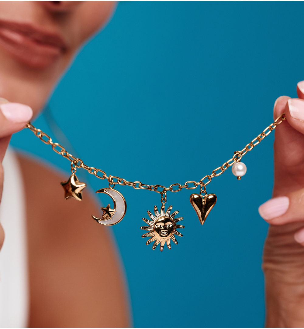Bransoletka złota z zawieszkami – serce, słońce, księżyc i gwiazda BSH0210