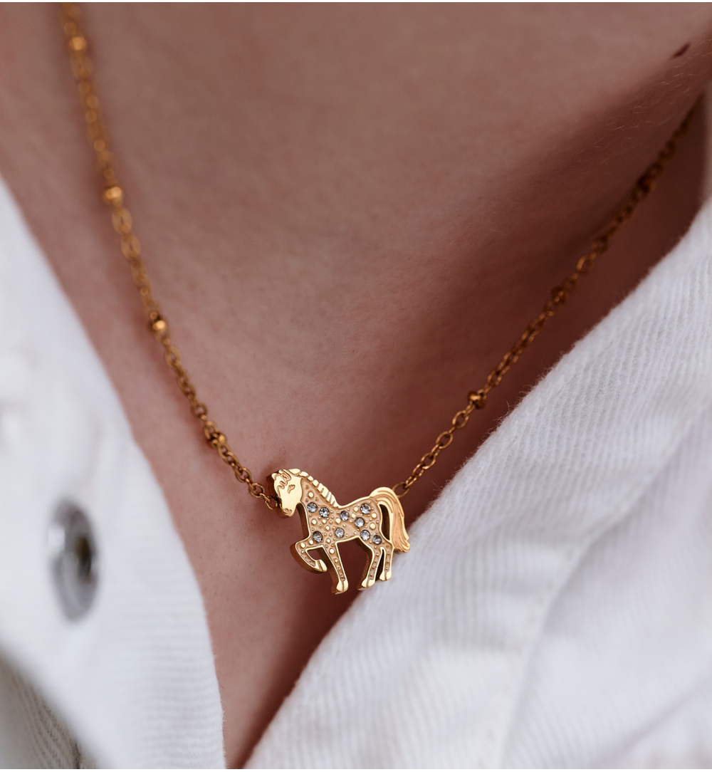 Zestaw biżuterii dla dziewczynki ze złotym konikiem ZN0218