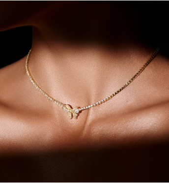 Naszyjnik typu tennis z zawieszką w kształcie kokardki NS0394