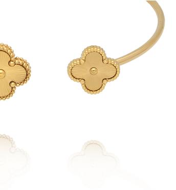 Bransoletka złota typu open cuff z motywem koniczyny BSY0537