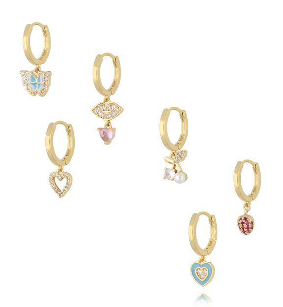 Zestaw złoconych kolczyków z zawieszkami – motywy serca, motyla i symboli  KMB0069