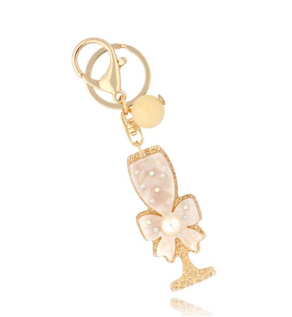 Brelok z białym kieliszkiem i kokardką Glow Gift BREZA0041