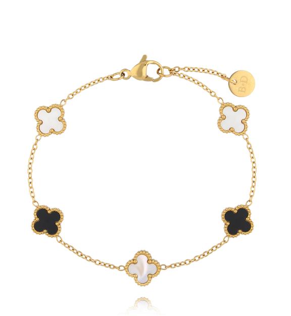 Bransoletka z białymi i czarnymi koniczynkami BSY0559
