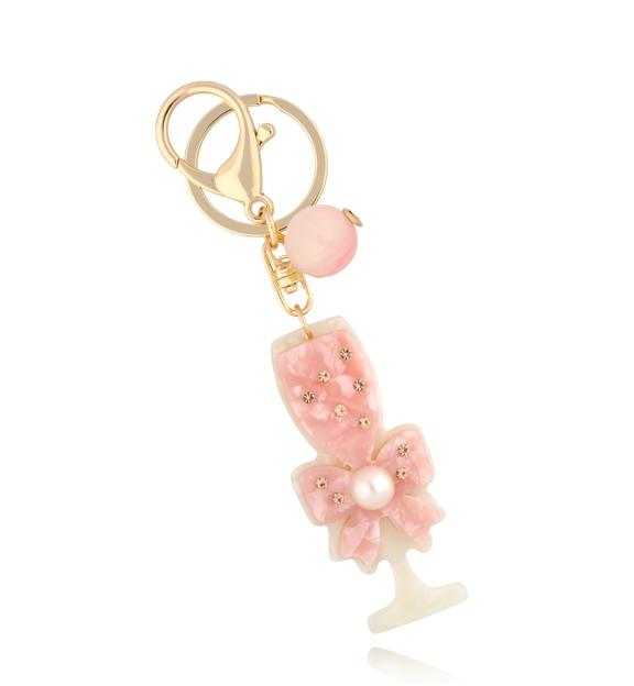 Brelok z różowym kieliszkiem i kokardką Glow Gift BREZA0042
